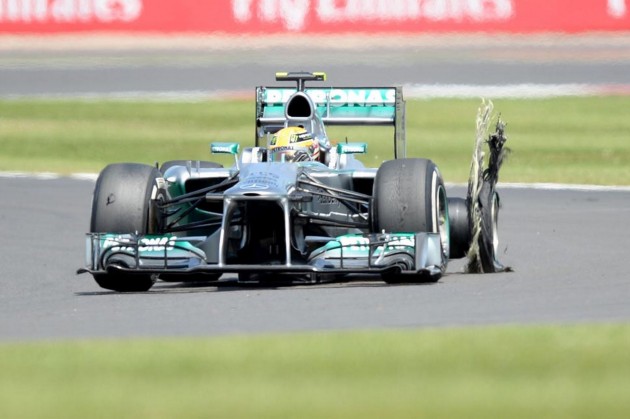 Lewis-Hamilton-with-a-burst-tyre-2012796